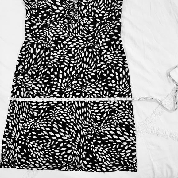 London Style Sleeveless Ruffle Dress | Black White V Neck Knee Length Polka Dot - Picture 8 of 9